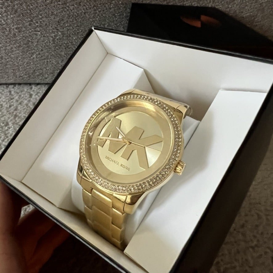 reloj dorado Michael Kors